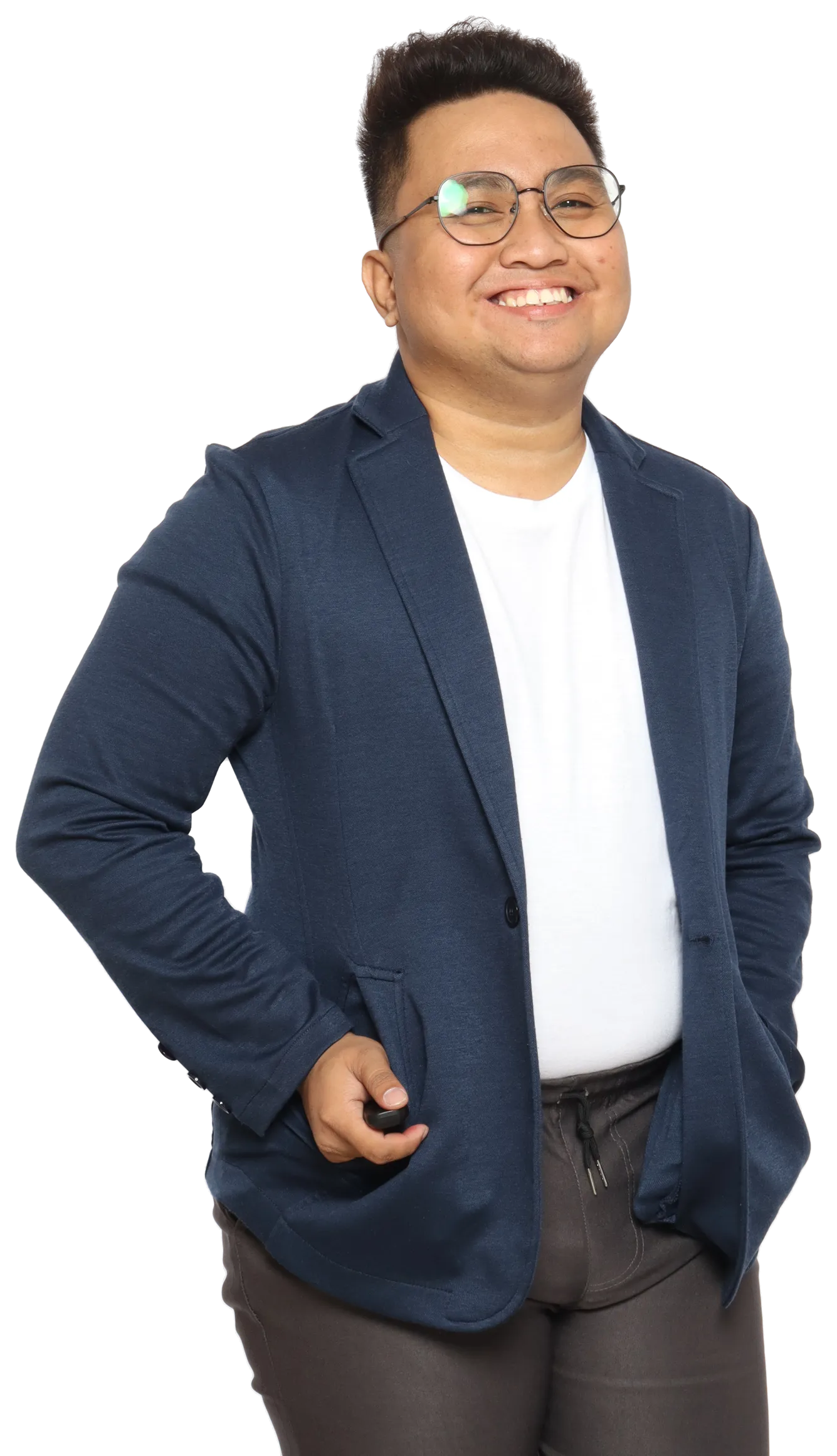 Joshua Ricafrente smiling in glasses and a navy blazer, one hand in a pocket.